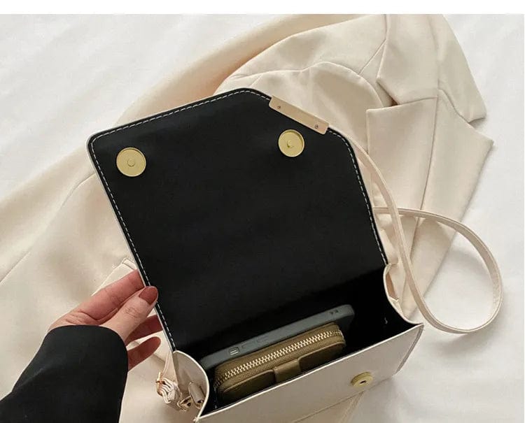 תיק כתף "קלאודיה" משובץ מעור מלאכותי איכותי - נעלי אביגיל