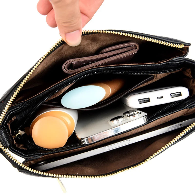 תיק יד "קונצ'טה" מעור אמיתי - נעלי אביגיל